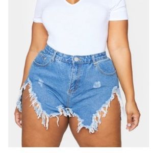 Plus Size Mid Wash Rip Denim Shorts